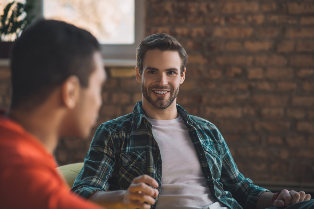two men discussing alcohol withdrawal in treatment